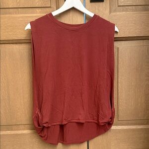 Athleta Sleeveless Rust Top: fits cropped.